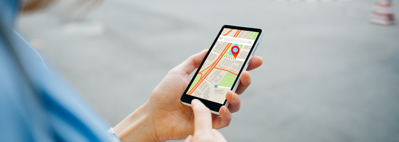 A person using a mobile transit app.