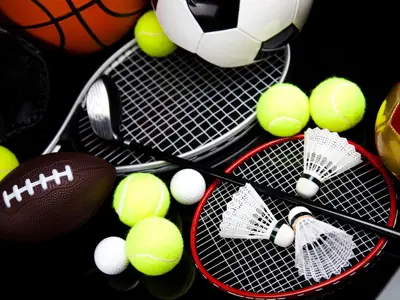 Sports equipment in a pile.