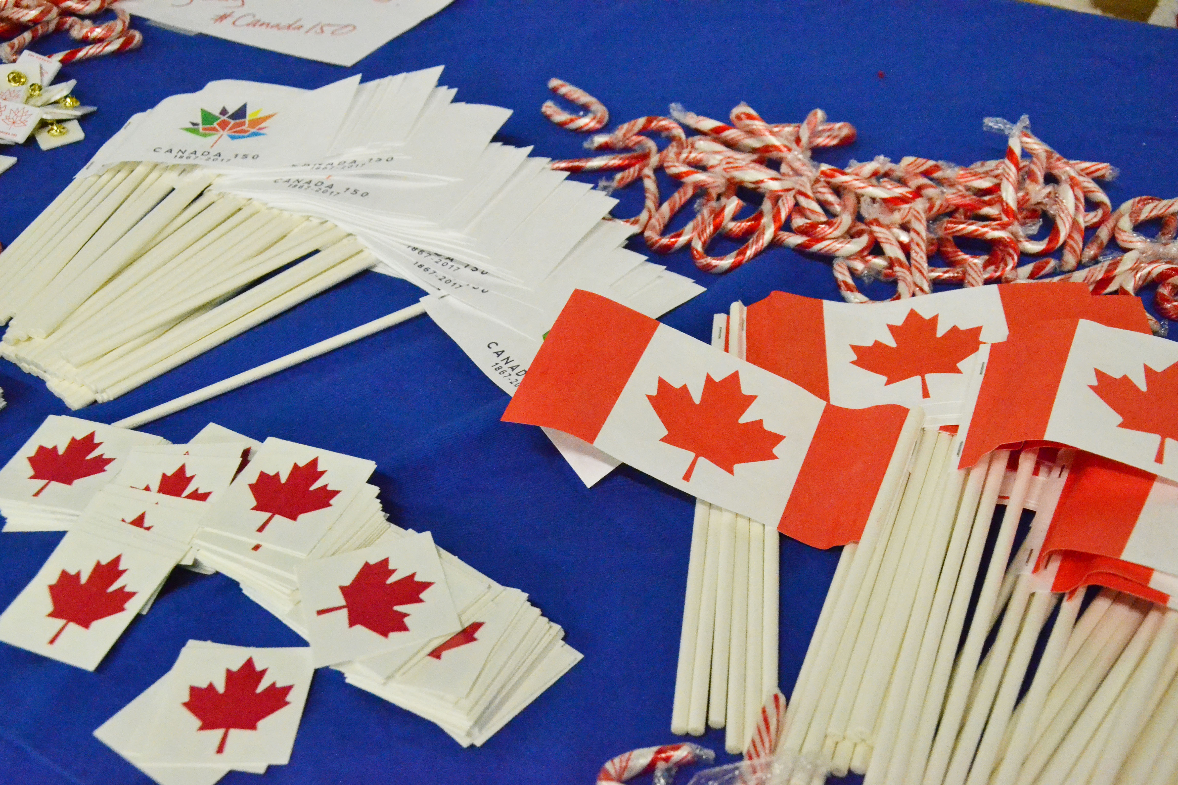 Canada flag items on a table.