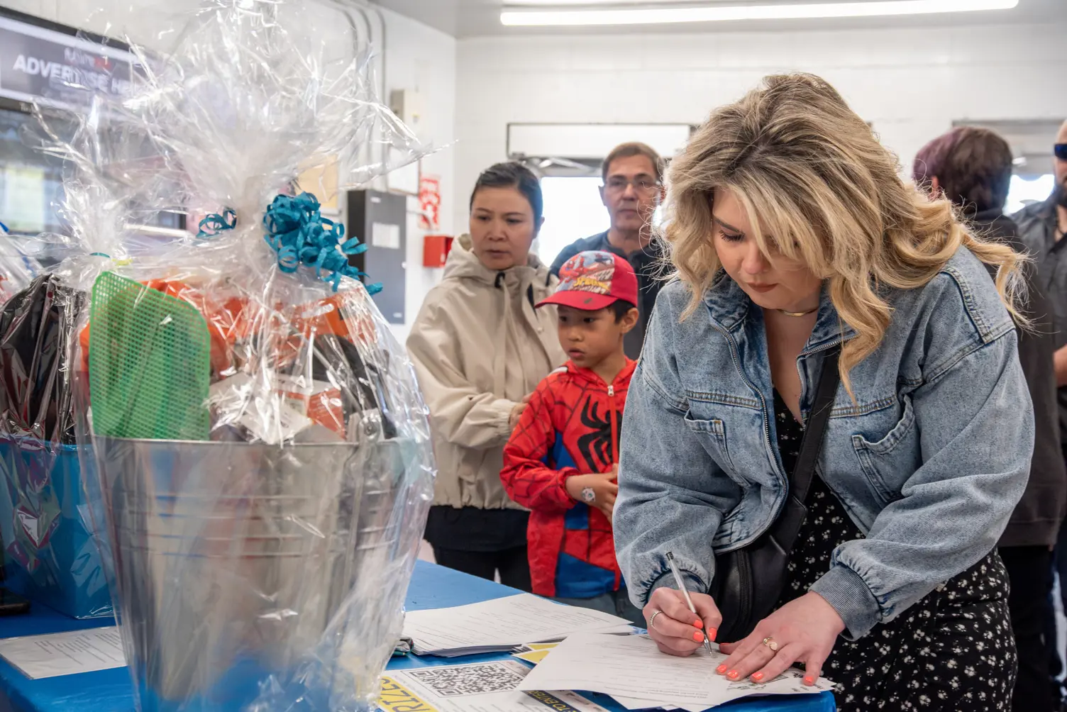 A woman filling out a form.