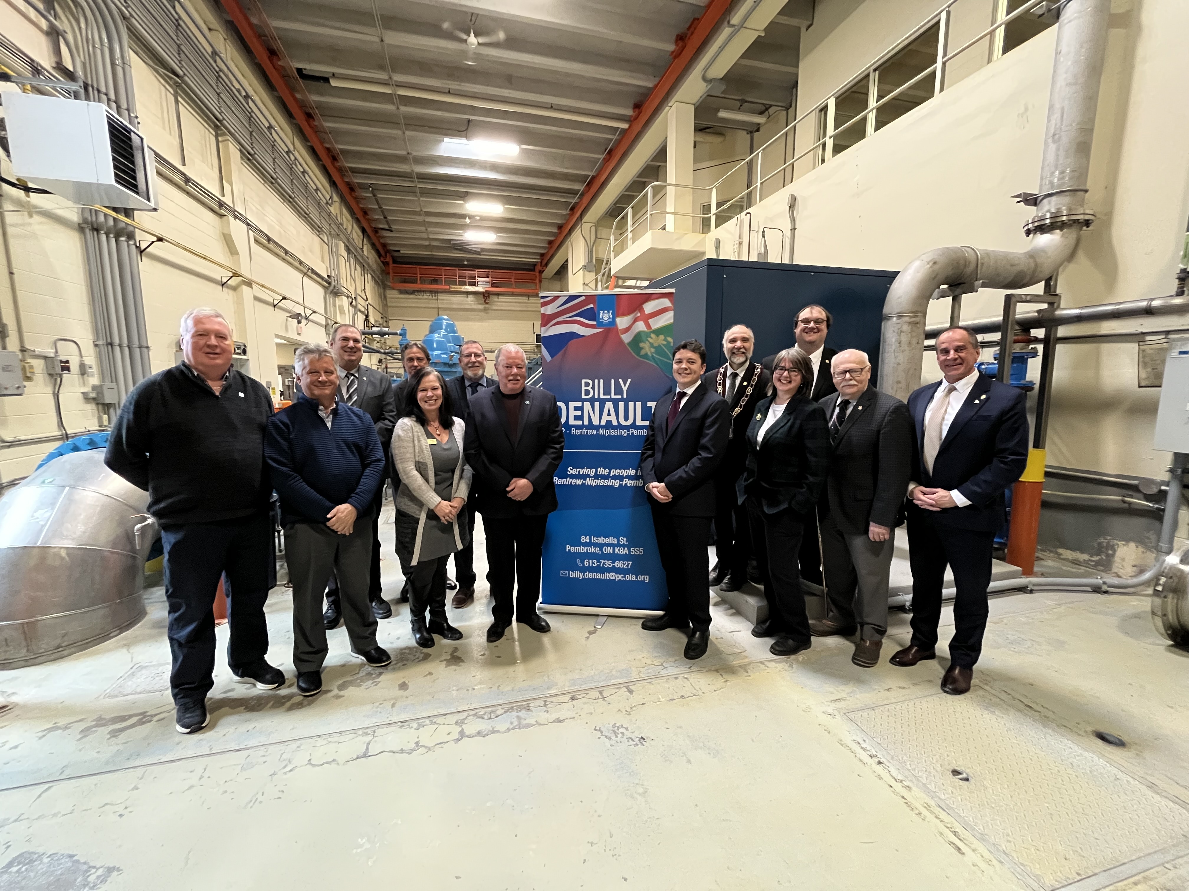 A group of people standing in a row.